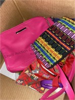 Box of assorted items purses, puzzle, backpack,