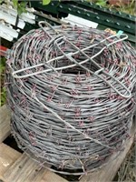 ROLL OF RED TIP BARBED WIRE