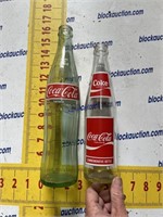 2 Coca Cola glass collector bottles