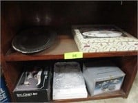 Dishes on bottom 2 shelves