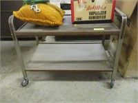 Metal TV stand on rollers