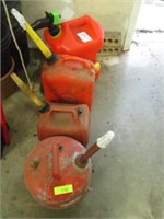 Metal gas can and 3 plastic gas cans