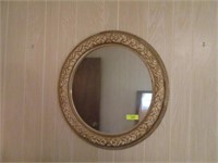 Round mirror and 2 pink lamps
