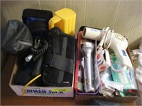 2 boxes flashlights, toothbrushes and misc