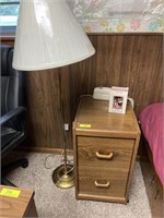 Filing cabinet, lamp, and figurine