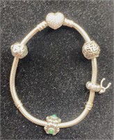 Pandora bracelet with 4 charms