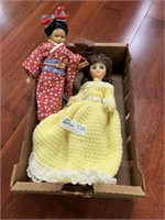 lot of two dolls one hand made dress