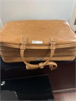 vintage samsonite heavy leather travel bag.