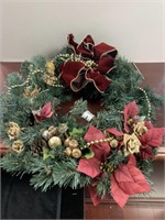 Christmas wreath with dark red bow