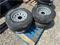 QTY 4- ST235/80R16 Radial Tires on Lug Wheels