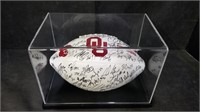 OU TEAM SIGNED FOOTBALL IN CASE