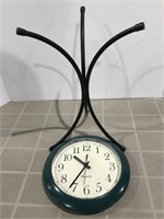 Metal Tripod Stand and a Wall Clock. Stand is