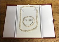 Pearl earrings, bracelet, and necklace set