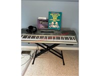 Casio Keyboard/headset and instructional books