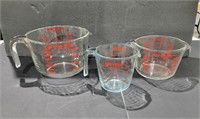 3 Pyrex Measuring Cups  - 8 cup has a chip in it