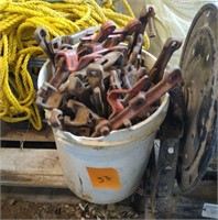 Bucket of Used Sickle Guards