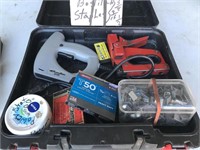 Pair of Staple Guns in a case with assortment of
