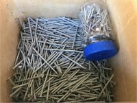 Partial box of 3.5” coated nails. And more.