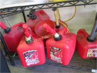 small gas cans and funnel