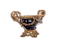 FRENCH PORCELAIN AND BRONZE MOUNTED CENTREPIECE