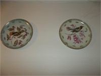 7 Collector's plates & 2 wall pockets