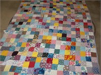 Handstitched patchwork quilt