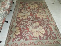 Floral mauve area rug