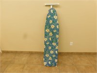 Adjustable metal ironing board