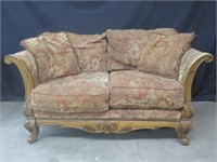 FLORAL UPHOLSTERY LOVESEAT ON MAHOGANY FRAME