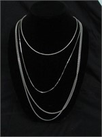 4 Silver Toned Necklaces