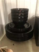 STACK OF BOWLS AND PLATES