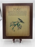 Vintage May origin on wood