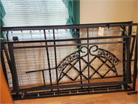 Day bed with metal head board.