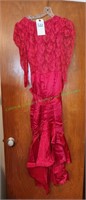 Red colored pagentry dress.