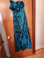 Emerald green pagentry dress with sequins.