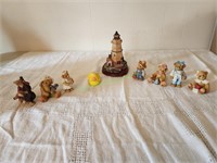 Bear, lighthouse and misc figurines.