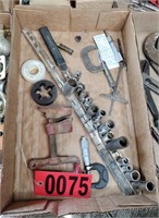 Flat of sockets, clamp, tools