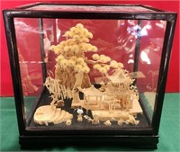 28 - CARVED ASIAN TEMPLE IN GLASS DISPLAY