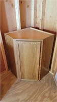 Corner oak wall cabinet