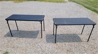 2 small fold up tables