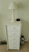 Small chest of drawers and lamp