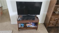 Samsung television, Funai VCR/DVD and stand