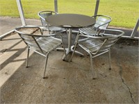 ALUMINUM CAFE TABLE AND 4 CHAIRS