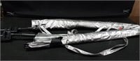 2- clamp on silver umbrellas