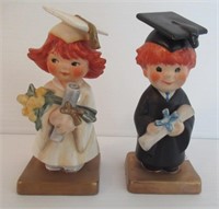 (2) Graduation Goebel figurines from 1970.