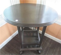 Wood painted table. Measures:  29 1/4" H x 24" W.