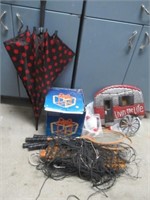 Camping trailer sign, badminton game with net,