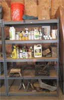 Shelf with contents that includes jack stands,