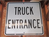 Truck entrance street sign.
