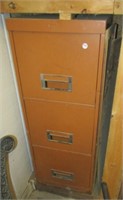 3 Drawer metal file cabinet with misc. contents.